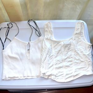 two white crop tops